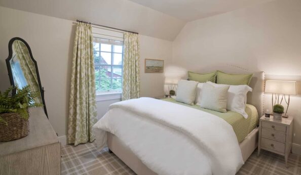 Farm House bedroom with green linens and accents